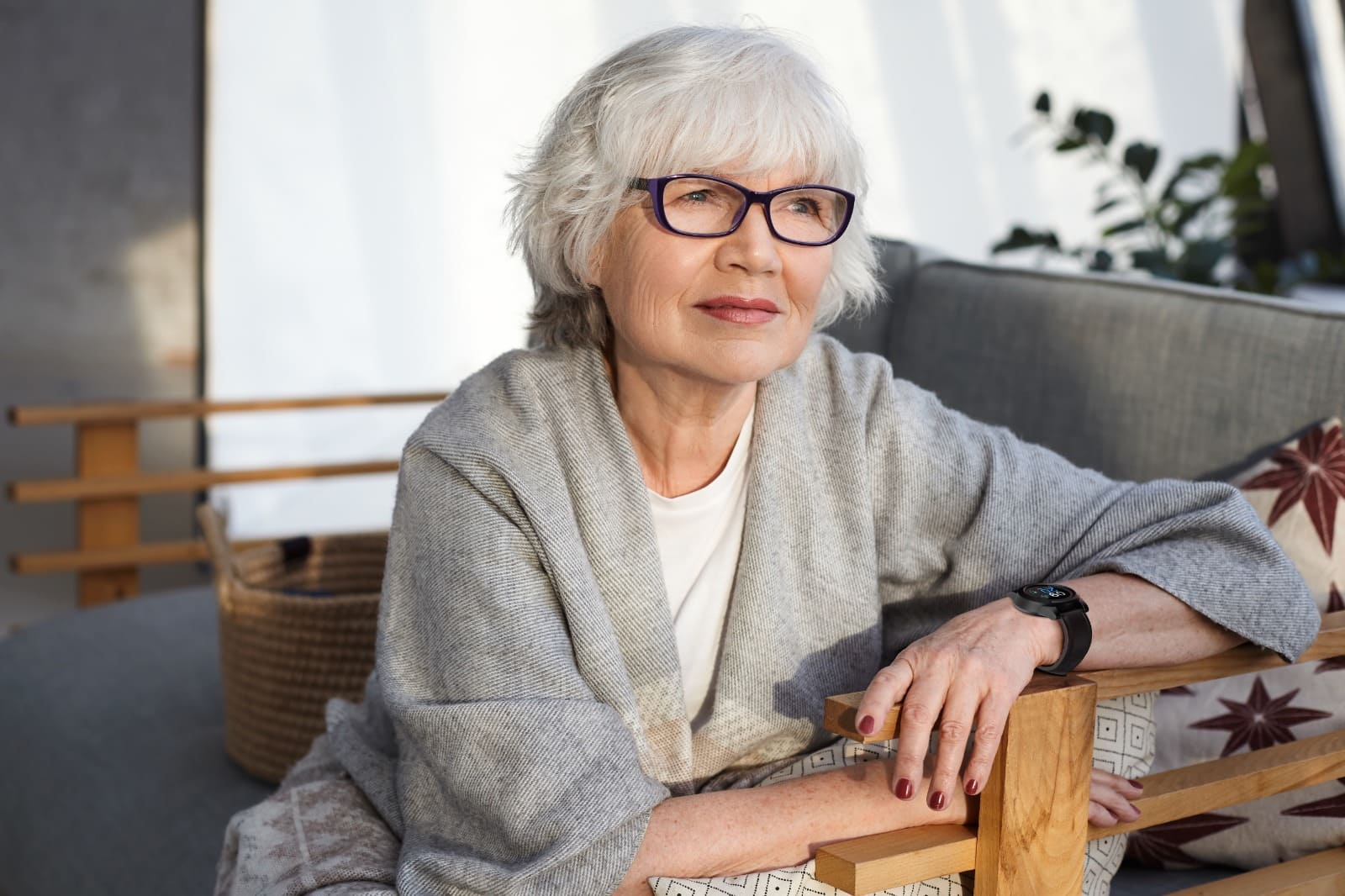 Senior woman wearing AevaAlert safety watch